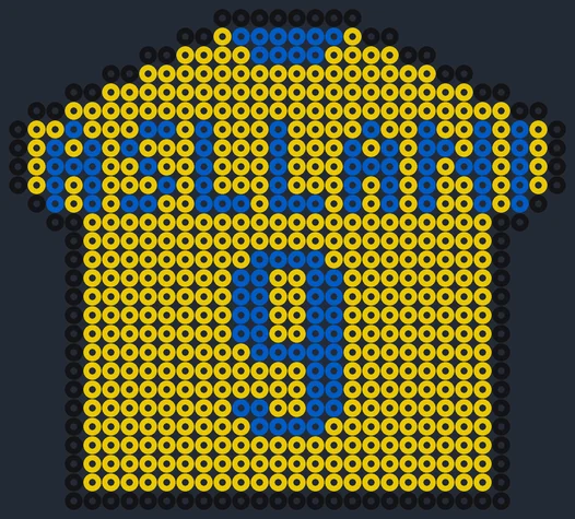 Damlandslagets tröja med ASLLANI och nummer 9 som pärlplatta